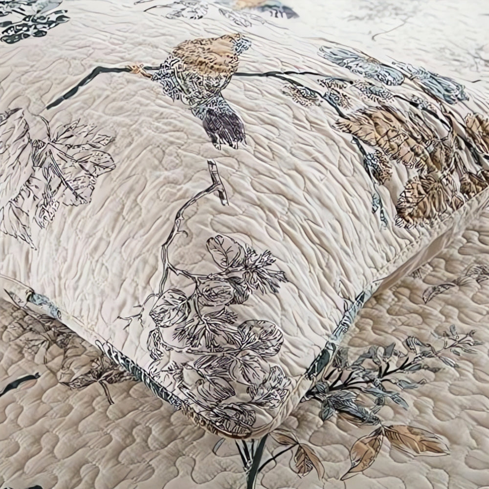Elegant floral coverlet quilted stitching detail close up