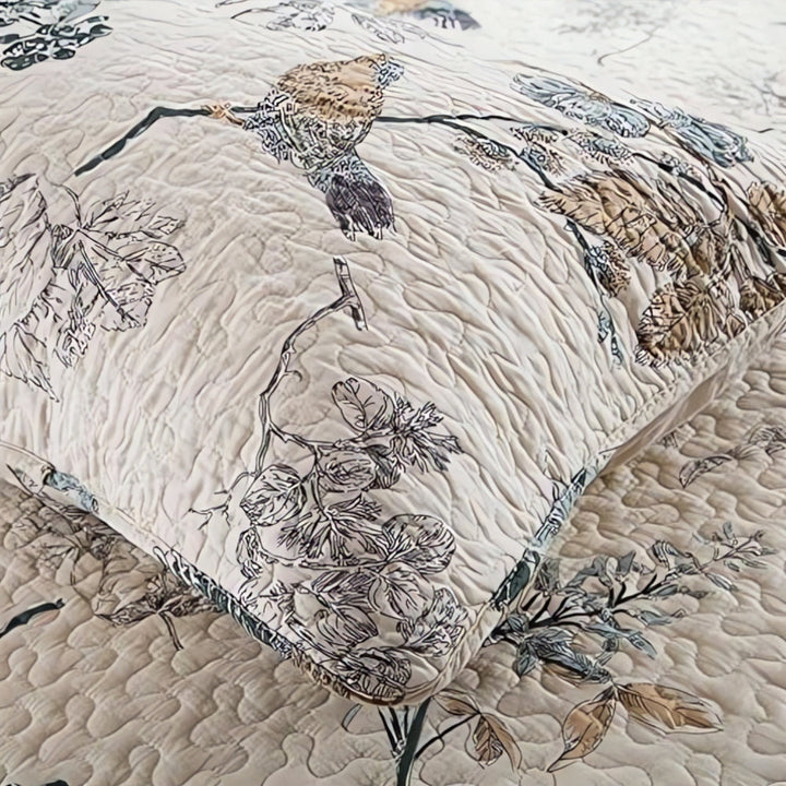 Elegant floral coverlet quilted stitching detail close up