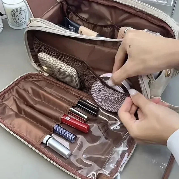Makeup bag interior mesh pockets and side organizer section; cosmetics not included