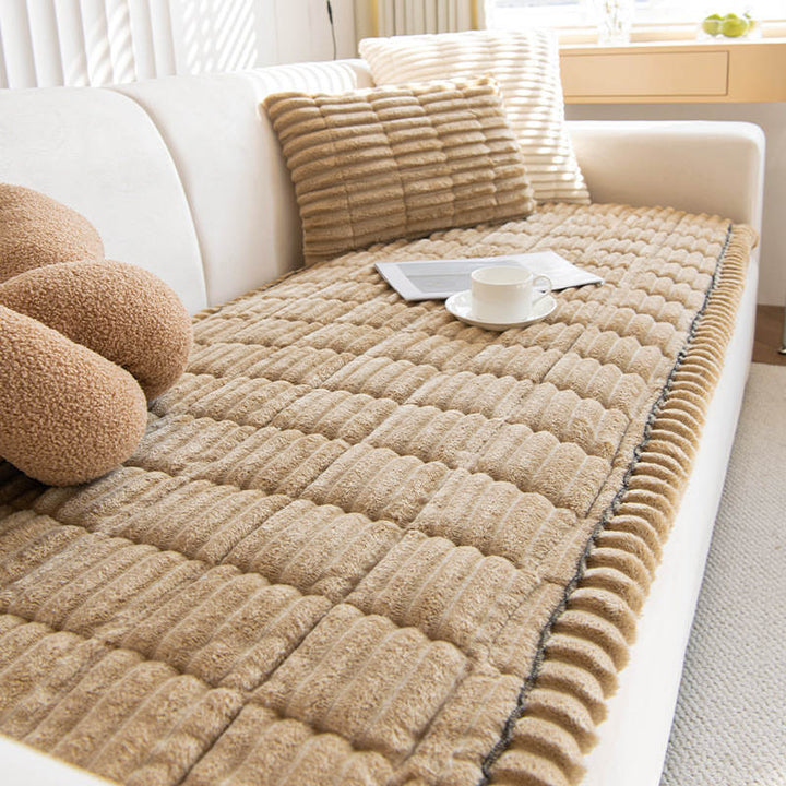 Plush velvet ribbed corduroy sofa slipcover on a modern lounge
