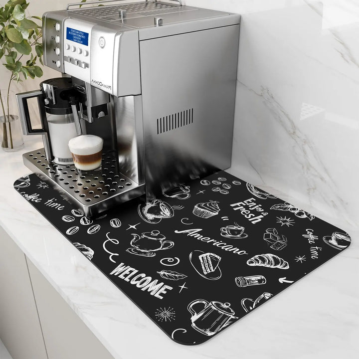 Black coffee print coffee maker mat on a counter