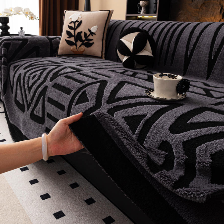 Boho maze couch throw draped over a three-seater sofa